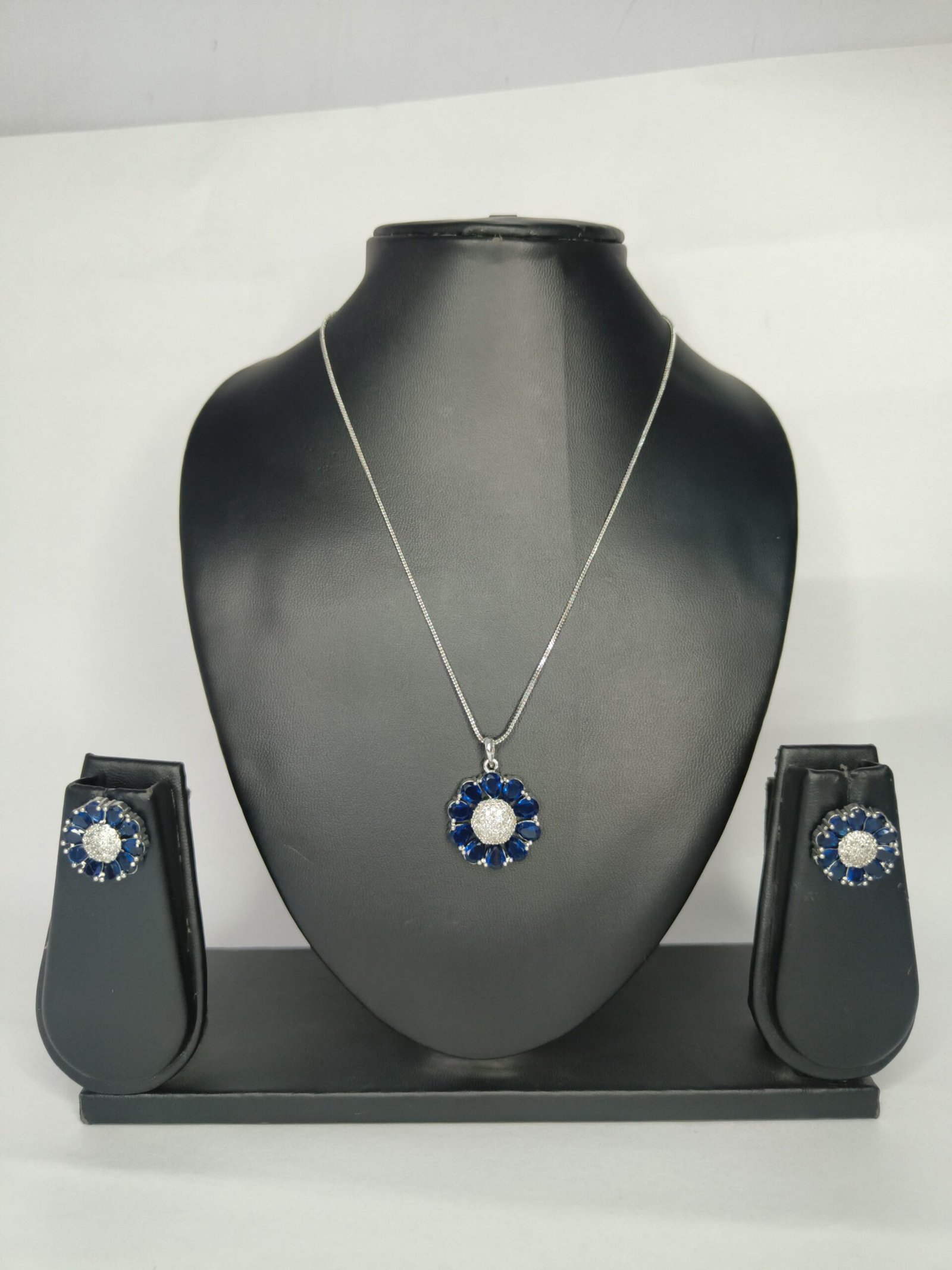 Shahi Pehnawa Rhodium Plated Silver Toned American Diamond Stone Studded Pendant set With Earring Jewellery Set For Women and Girl