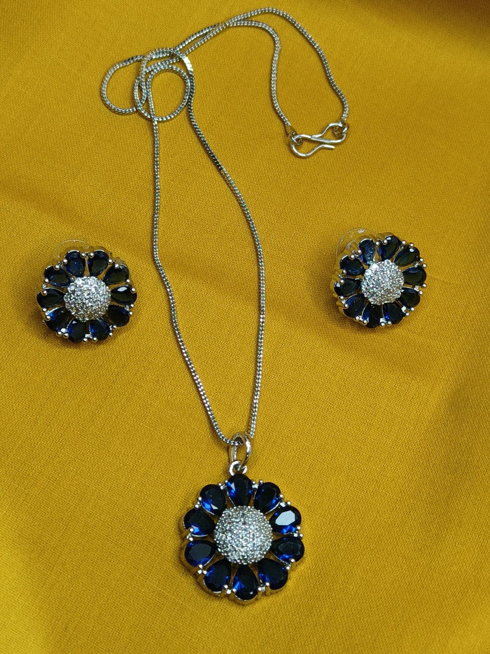 Shahi Pehnawa Rhodium Plated Silver Toned American Diamond Stone Studded Pendant set With Earring Jewellery Set For Women and Girl