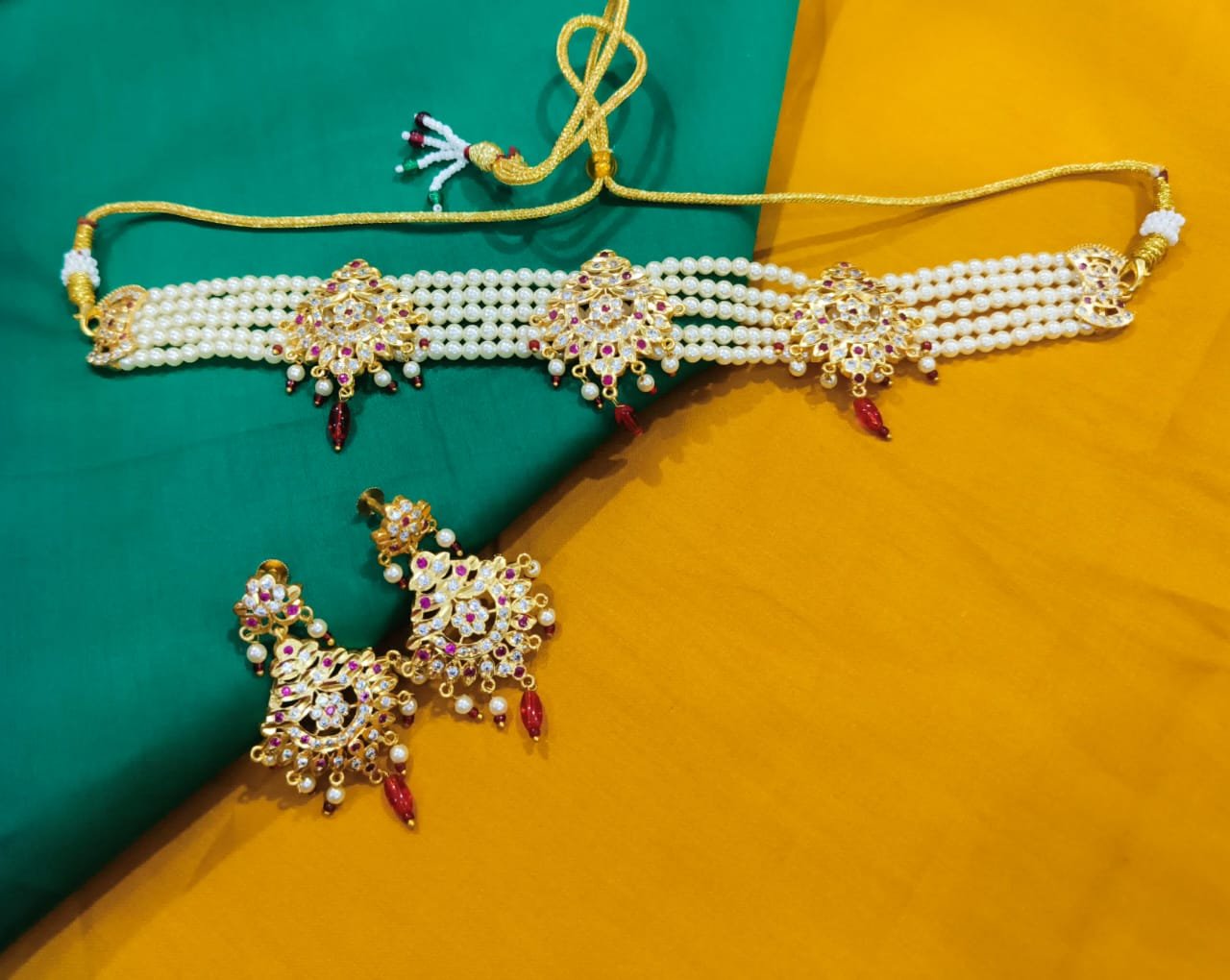 Handcrafted Jadau Gold Polished Necklace Chik Set with Matching Earrings